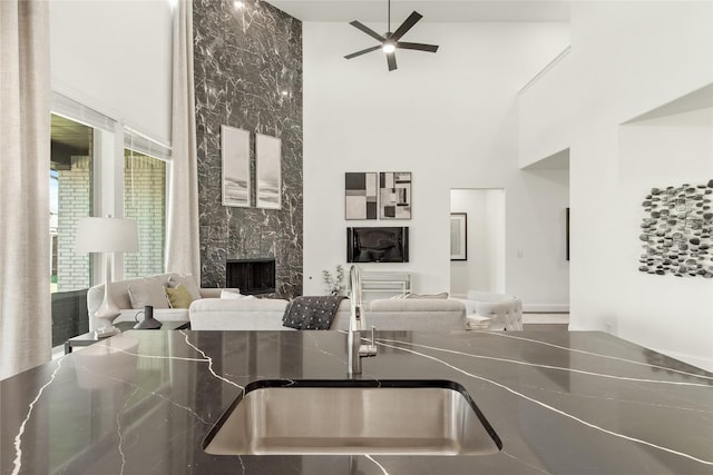 1013 Canuela Way, Fort Worth, TX 76247 - kitchen featuring a sink, stainless steel gas stovetop, light wood-type flooring, backsplash, and white cabinetry