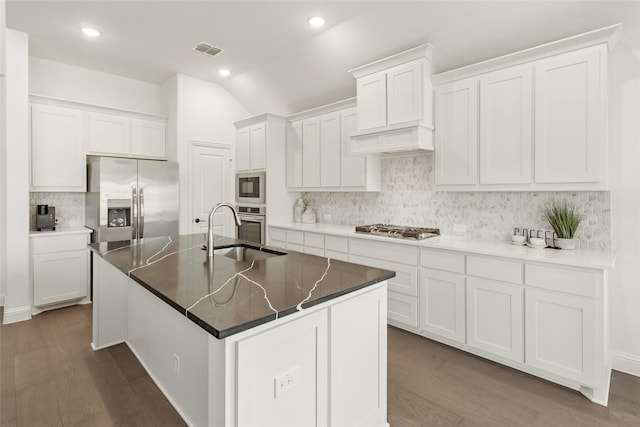 1013 Canuela Way, Fort Worth, TX 76247 - kitchen featuring stainless steel countertops, a towering ceiling, a sink, ceiling fan, and a premium fireplace