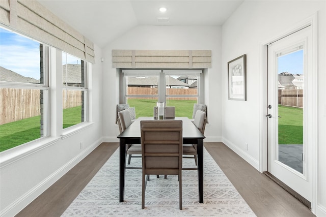 1013 Canuela Way, Fort Worth, TX 76247 - kitchen featuring appliances with stainless steel finishes, a sink, dark wood finished floors, lofted ceiling, and white cabinetry