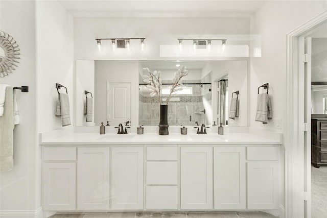 1013 Canuela Way, Fort Worth, TX 76247 - bathroom featuring a shower stall, recessed lighting, a walk in closet, double vanity, and marble look tile flooring
