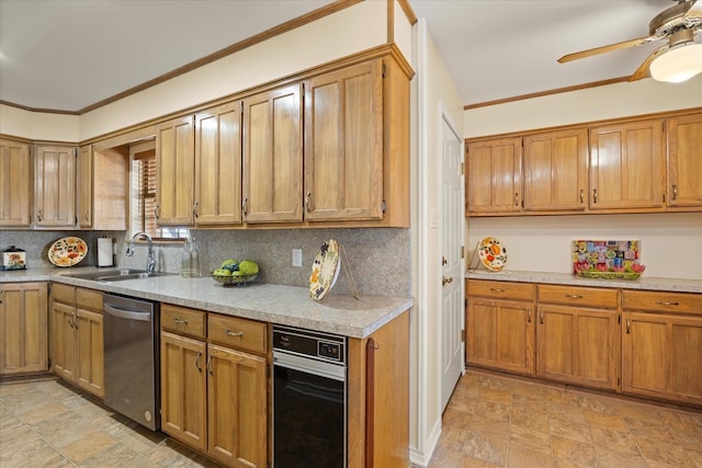 kitchen with tasteful backsplash, ceiling fan, dishwasher, and a sink