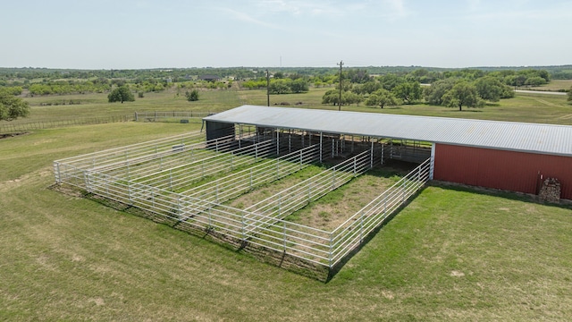 birds eye view of property featuring a rural view