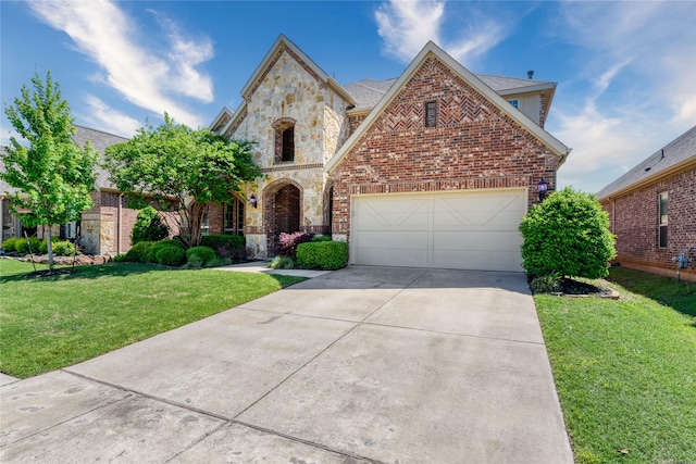 view of front of house with a front lawn, stone siding, concrete driveway, a garage, and brick siding