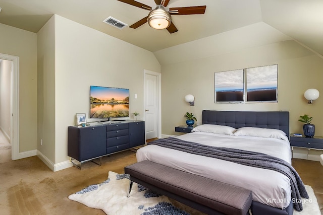bedroom with vaulted ceiling, baseboards, visible vents, a ceiling fan, and carpet floors