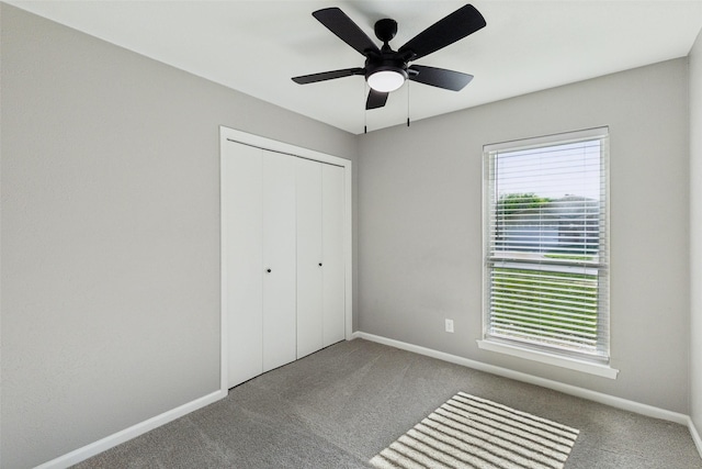 1001 Roaring Springs Dr, Allen, TX 75002 - unfurnished bedroom featuring carpet, a closet, baseboards, and ceiling fan