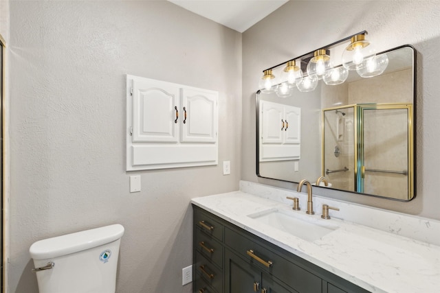 1001 Roaring Springs Dr, Allen, TX 75002 - full bath featuring a stall shower, toilet, and vanity