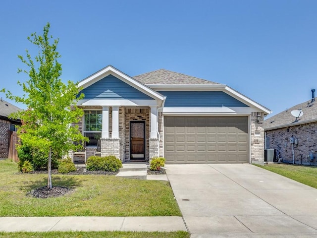 1116 Fulbourne Dr, Anna, TX 75409 - craftsman-style home featuring a garage, cooling unit, brick siding, a front yard, and concrete driveway