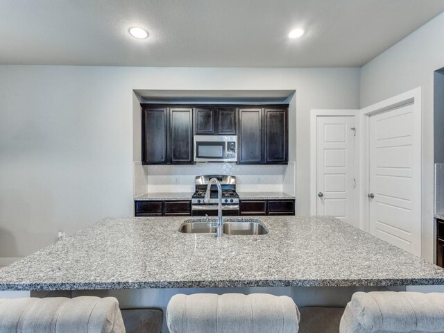1116 Fulbourne Dr, Anna, TX 75409 - living room with a brick fireplace, ceiling fan, dark wood-style flooring, baseboards, and recessed lighting