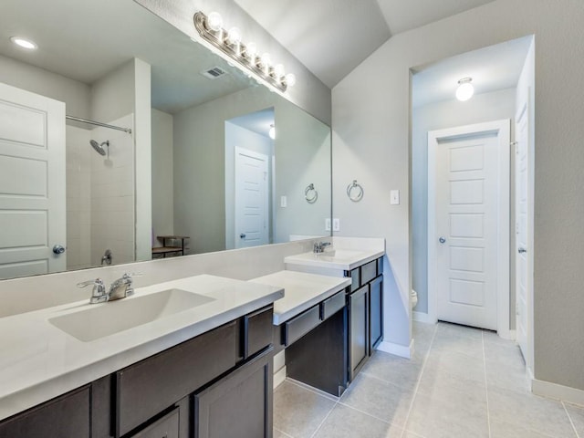 1116 Fulbourne Dr, Anna, TX 75409 - full bath featuring double vanity, toilet, tile patterned floors, baseboards, and a tile shower
