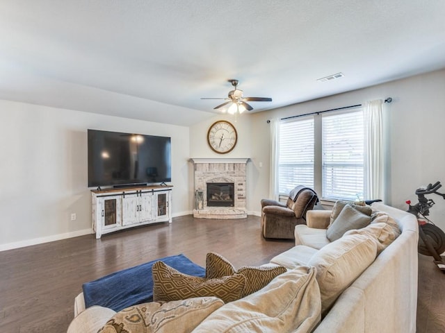 1116 Fulbourne Dr, Anna, TX 75409 - living area with ceiling fan, a fireplace, wood finished floors, and baseboards