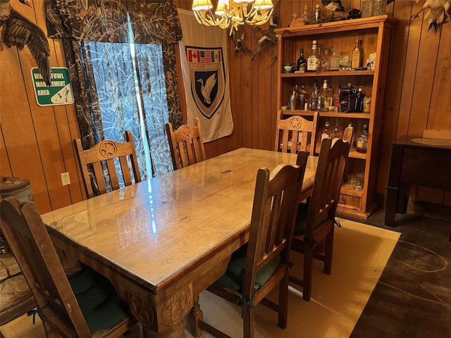 15095 US Highway 82 E, No City, TX 76380 - dining space with wooden walls and a notable chandelier