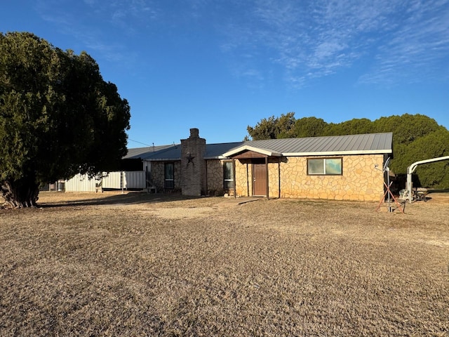 15095 US Highway 82 E, No City, TX 76380 - view of front facade with a standing seam roof, metal roof, and stone siding