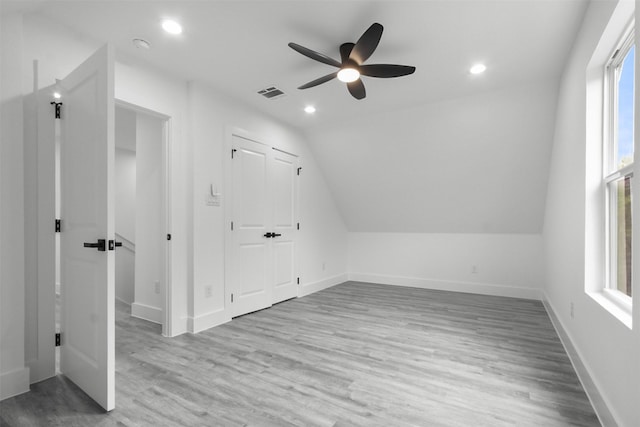 bonus room with visible vents, lofted ceiling, wood finished floors, recessed lighting, and a ceiling fan