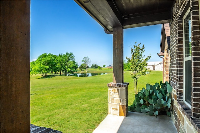 view of yard with a water view