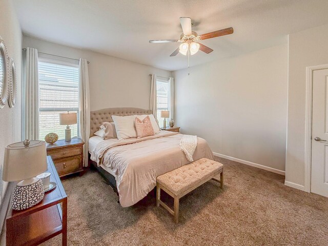 1005 Napier Way, Fort Worth, TX 76247 - bedroom featuring light carpet, ceiling fan, ensuite bath, and baseboards