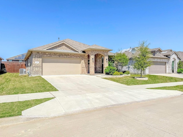 1005 Napier Way, Fort Worth, TX 76247 - single story home featuring driveway, central AC unit, brick siding, a garage, and a shingled roof