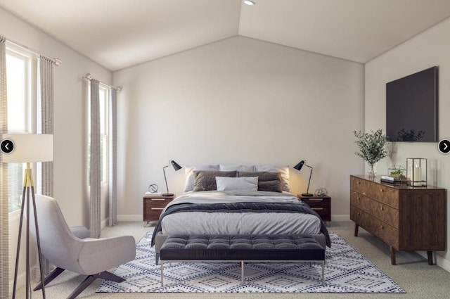 bedroom featuring light colored carpet, baseboards, and vaulted ceiling