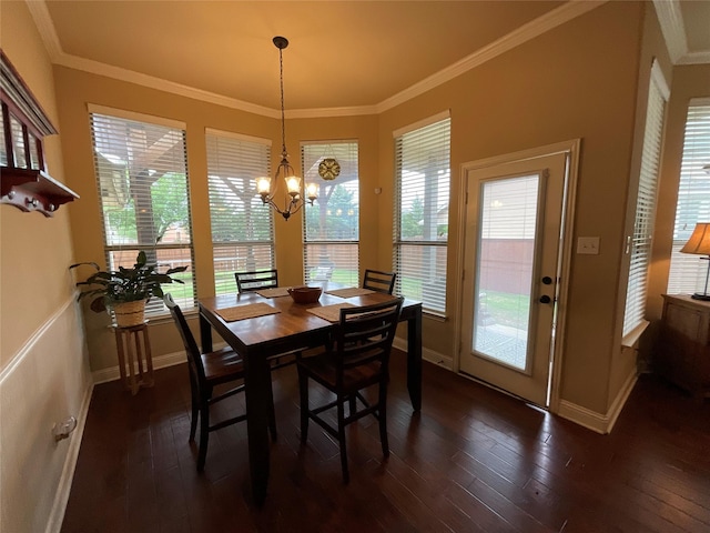 dining space featuring plenty of natural light, an inviting chandelier, and dark wood-style flooring