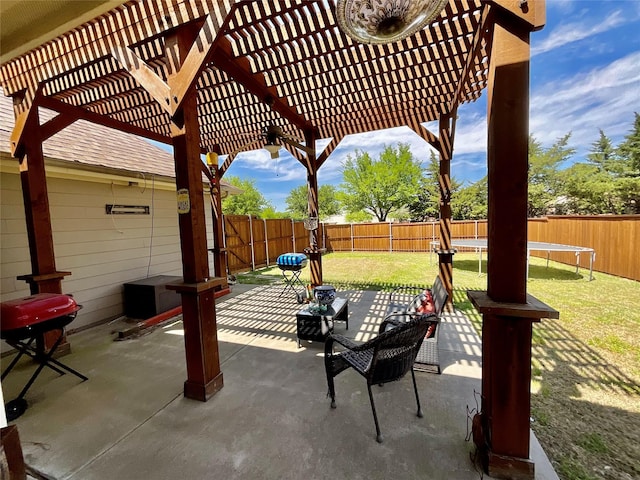 view of patio with a pergola and a fenced backyard