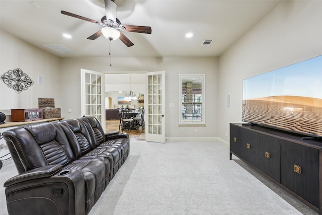1011 Caribou Dr, Prosper, TX 75078 - living room with a ceiling fan, light carpet, and french doors