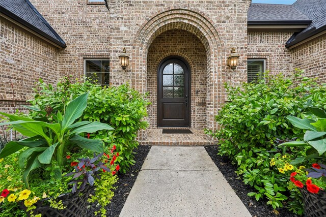 1011 Caribou Dr, Prosper, TX 75078 - doorway to property with brick siding