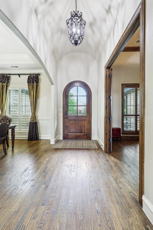 1011 Caribou Dr, Prosper, TX 75078 - dining space featuring a chandelier, healthy amount of natural light, wood finished floors, and crown molding