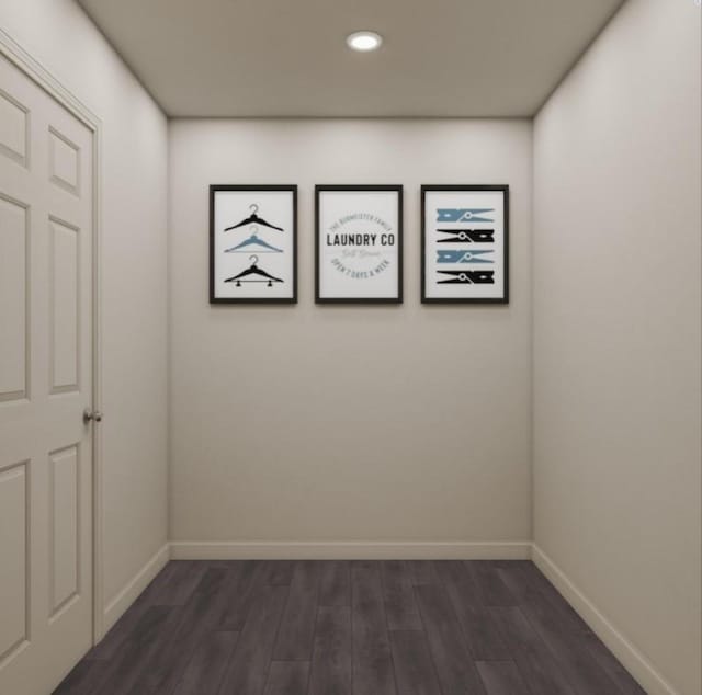 spare room with recessed lighting, dark wood-style floors, and baseboards