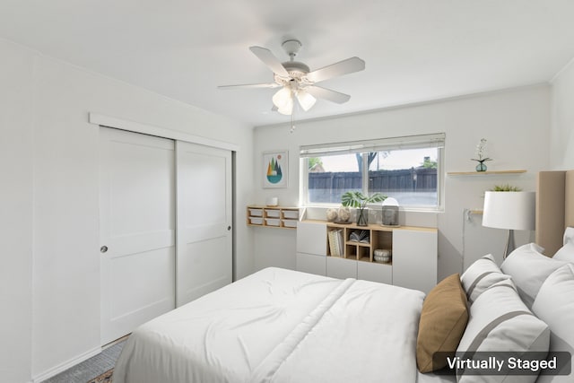 bedroom with a closet and ceiling fan