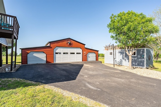 1674 Vz County Road 1514, Grand Saline, TX 75140 - view of front of house with a garage and an outdoor structure