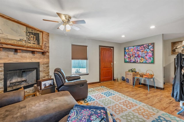 1674 Vz County Road 1514, Grand Saline, TX 75140 - living area featuring ceiling fan, a stone fireplace, recessed lighting, wood finished floors, and baseboards