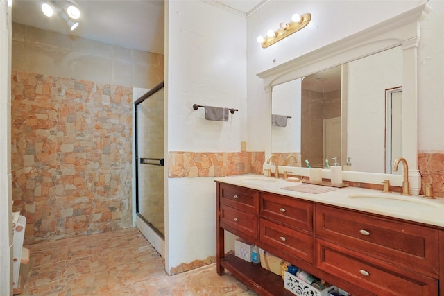 4916 Gooseberry Trl, Granbury, TX 76048 - full bathroom featuring a sink, tile walls, a shower stall, and double vanity