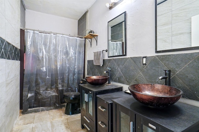 4916 Gooseberry Trl, Granbury, TX 76048 - full bathroom with toilet, a sink, and tile walls