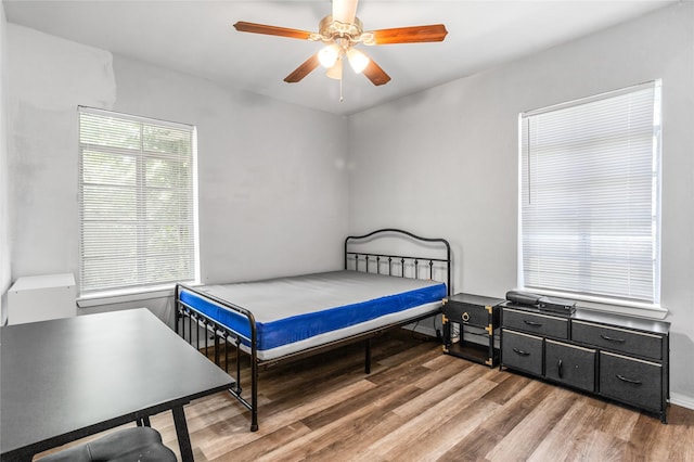 4040 Carolyn Rd, Fort Worth, TX 76109 - bedroom with wood finished floors and ceiling fan