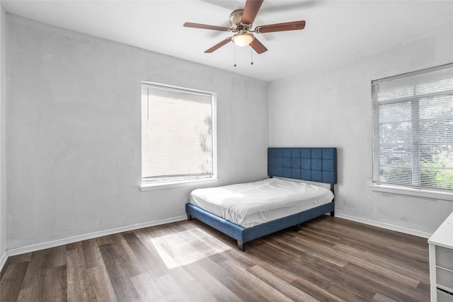 4040 Carolyn Rd, Fort Worth, TX 76109 - bedroom with dark wood-style floors, baseboards, and ceiling fan