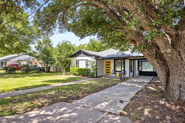 4040 Carolyn Rd, Fort Worth, TX 76109 - mid-century inspired home with a front yard and stucco siding