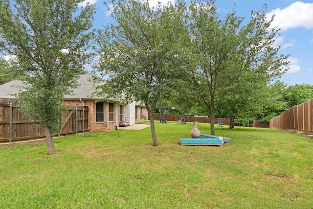 view of yard featuring a fenced backyard