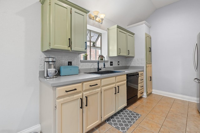 kitchen with a sink, green cabinetry, black dishwasher, and light countertops