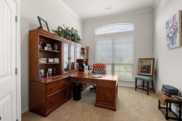 office space with light carpet, visible vents, baseboards, and ornamental molding