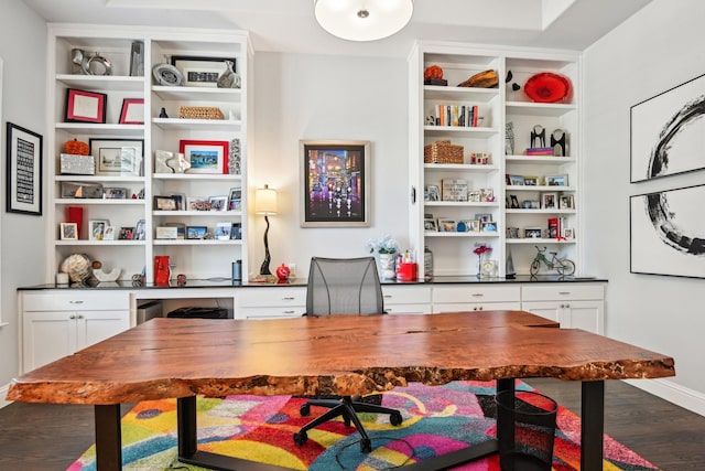 home office with baseboards and wood finished floors