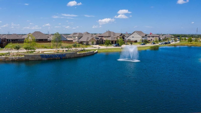 property view of water with a residential view