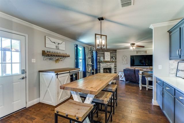 4505 Pangolin Dr, Fort Worth, TX 76244 - dining room with ornamental molding, ceiling fan with notable chandelier, visible vents, and plenty of natural light