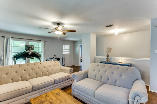 4505 Pangolin Dr, Fort Worth, TX 76244 - living room featuring wood finished floors, visible vents, baseboards, and ceiling fan