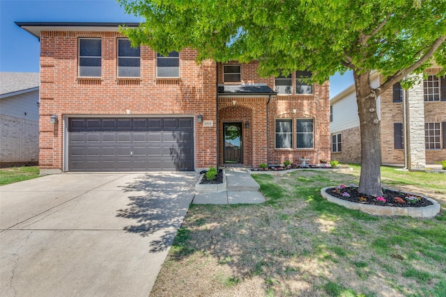 4505 Pangolin Dr, Fort Worth, TX 76244 - traditional home featuring driveway, brick siding, a front yard, and a garage