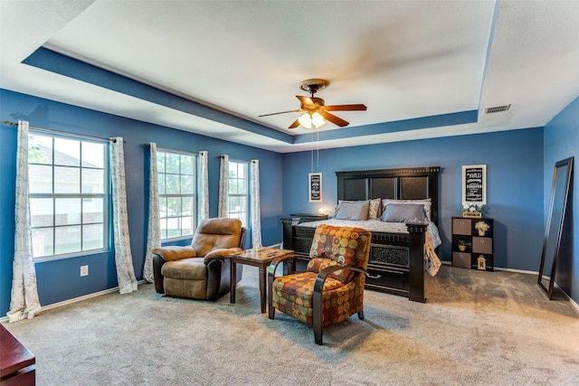 4505 Pangolin Dr, Fort Worth, TX 76244 - carpeted bedroom with ceiling fan, baseboards, visible vents, and a raised ceiling