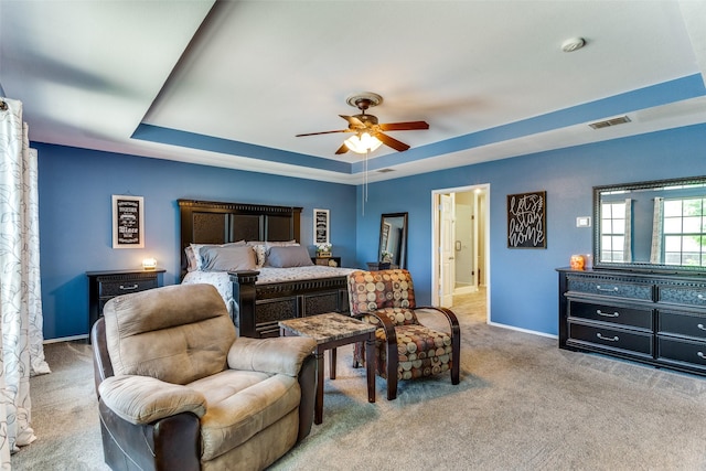 4505 Pangolin Dr, Fort Worth, TX 76244 - bedroom with a tray ceiling, visible vents, a ceiling fan, carpet floors, and baseboards