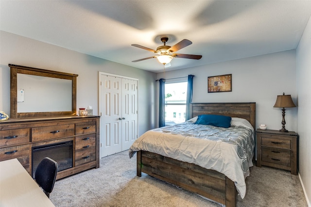 4505 Pangolin Dr, Fort Worth, TX 76244 - bedroom featuring ceiling fan, a closet, and light carpet