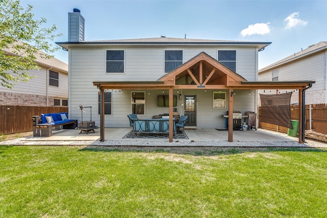 4505 Pangolin Dr, Fort Worth, TX 76244 - back of property with a lawn, fence, an outdoor living space, and a patio