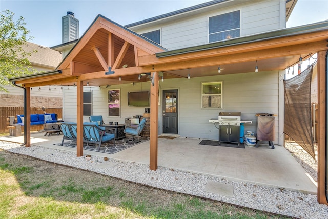 4505 Pangolin Dr, Fort Worth, TX 76244 - back of house featuring fence, outdoor lounge area, a chimney, and a patio