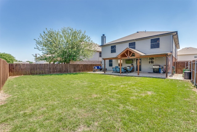 4505 Pangolin Dr, Fort Worth, TX 76244 - rear view of house featuring a patio, a chimney, a fenced backyard, and a lawn