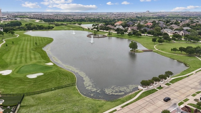birds eye view of property featuring a water view, golf course view, and a residential view